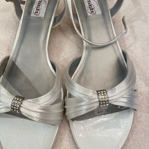 New in box A pair of Dyeable Bridal Sandals in white satin size 12EE